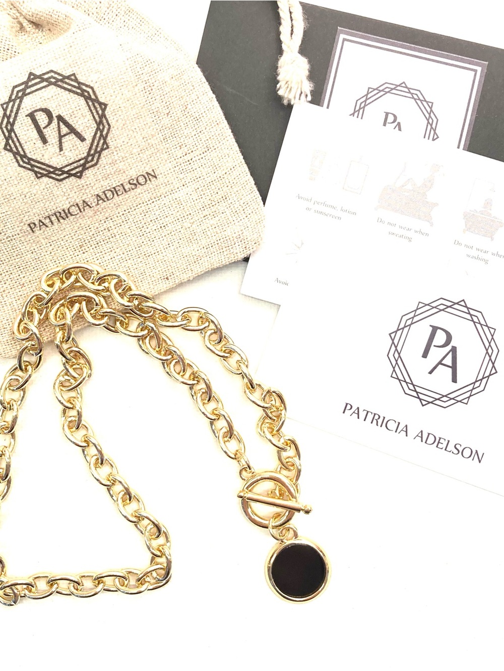 Gold Chain Toggle Necklace with Black Pendant
